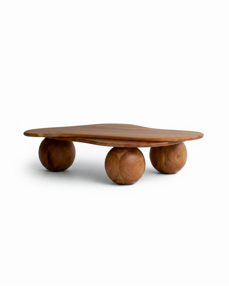 Wooden coffee table with round bases on a white background